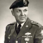 Master Sgt. Charles E. Hosking Jr. in service dress uniform, a distinguished figure of military honor.