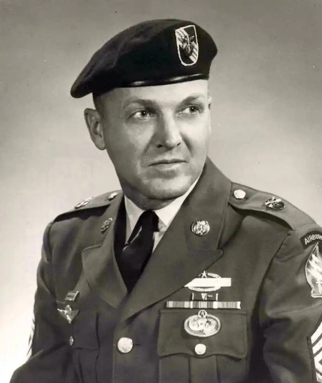 Master Sgt. Charles E. Hosking Jr. in service dress uniform, a distinguished figure of military honor.