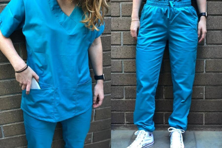 Nurse modeling top and bottom of nursing scrubs Uniform Advantage nursing scrubs review showcasing fit and style