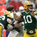 Green Bay Packers 1994 Throwback Uniform in Muddy Game