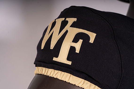 Wake Forest Demon Deacons football uniform player detail, focusing on the fit and fabric of the updated Nike Vapor Untouchable template.