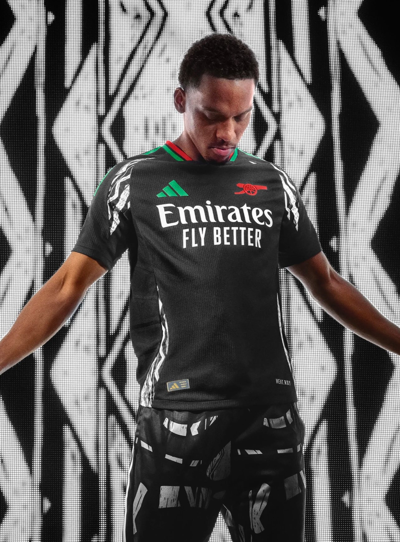 Arsenal 2024-2025 Away Jersey: A vibrant design by Adidas.