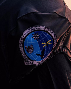 AFSOC badge for Special Tactics Officer on Air Force football uniform