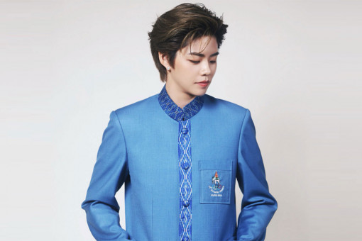 Thai badminton player Sapsiree Taerattanachai models a new outfit for Thai athletes competing at the Olympic Games 2024 in Paris. The outfit has received a mixed response. (Photo: Stadium TH Facebook Page)