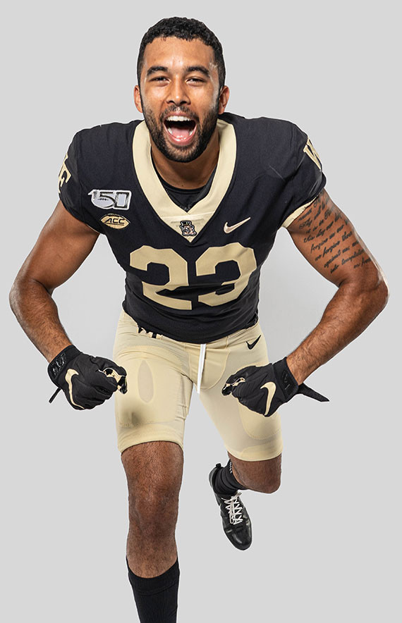 Close-up of the new Wake Forest Demon Deacons football uniform collar, highlighting the Demon Deacon mascot and updated Nike Vapor Untouchable template.