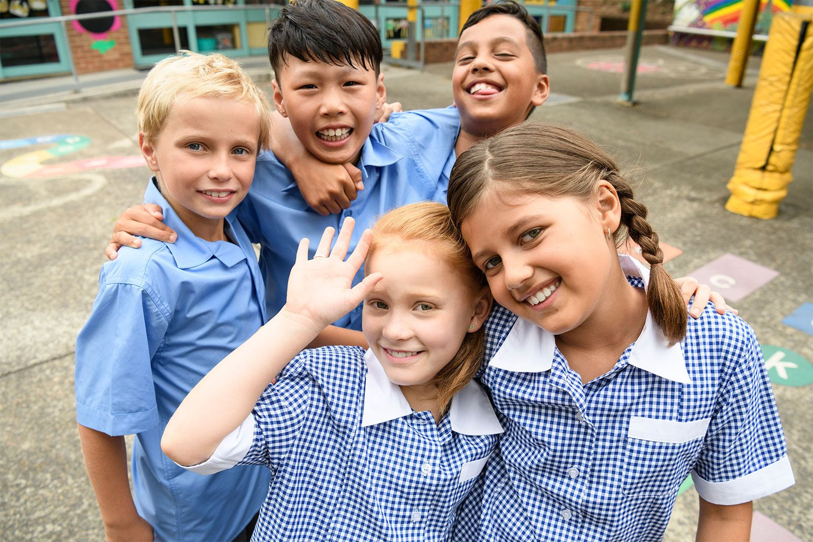 Students in school uniforms on elementary school playground