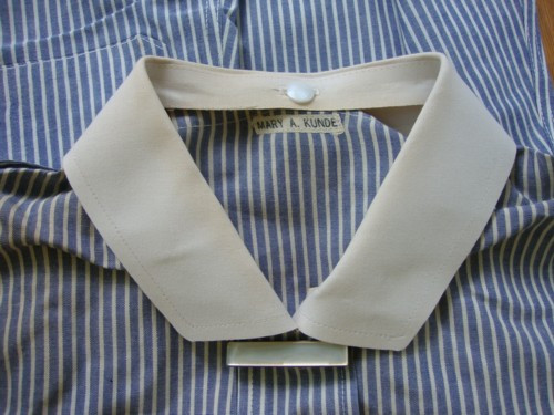 Detailed view of the collar and cuffs of an old nurse uniform
