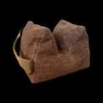 Close-up of Tango Uniform rifle support bag in brown waxed canvas.