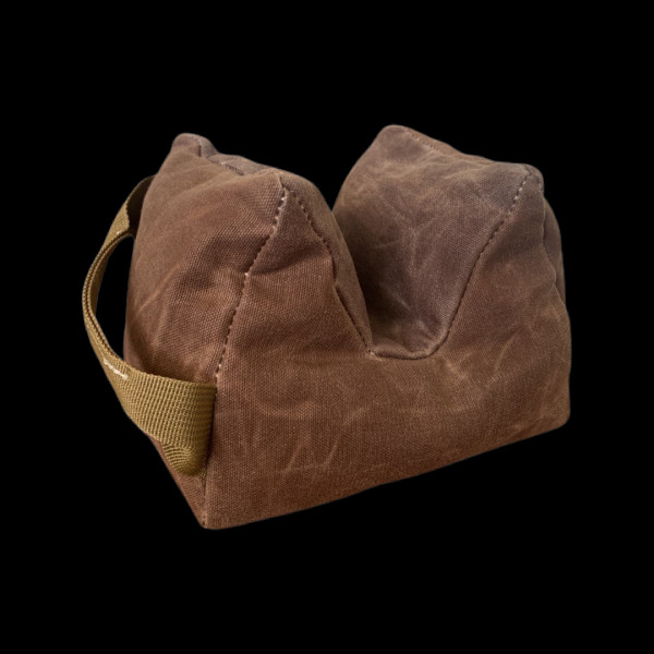 Close-up of Tango Uniform rifle support bag in brown waxed canvas.