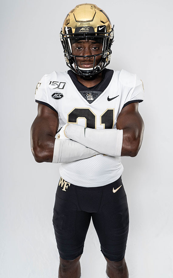 Wake Forest Demon Deacons football team in their new 2019 uniforms, showcasing the full kit and on-field look.