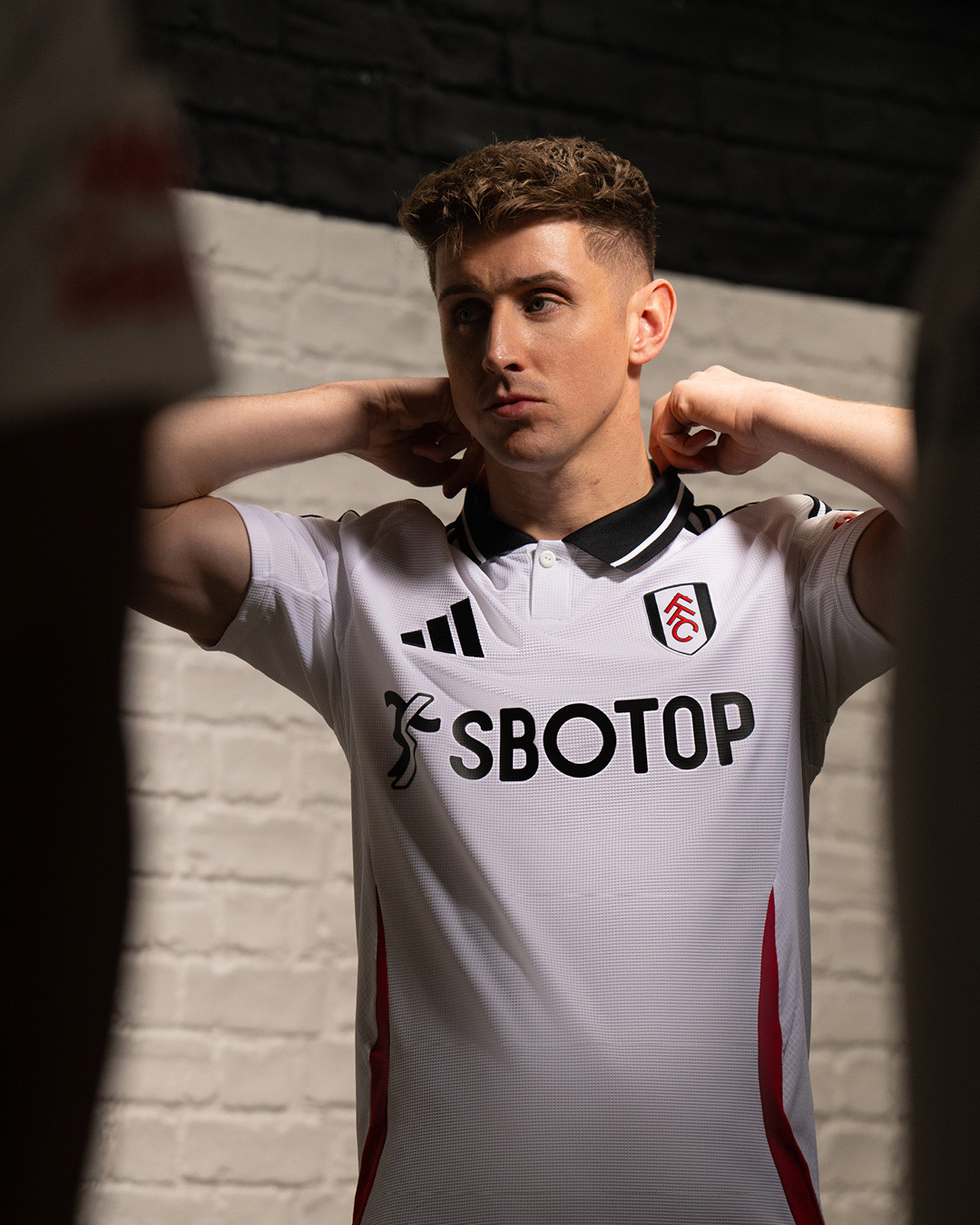 Fulham 2024-2025 Home Jersey: A traditional design by Adidas.