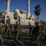 Al-Qassam Brigades fighters during a military show in Gaza City in July 2022