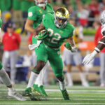 WVU Notre Dame green uniforms