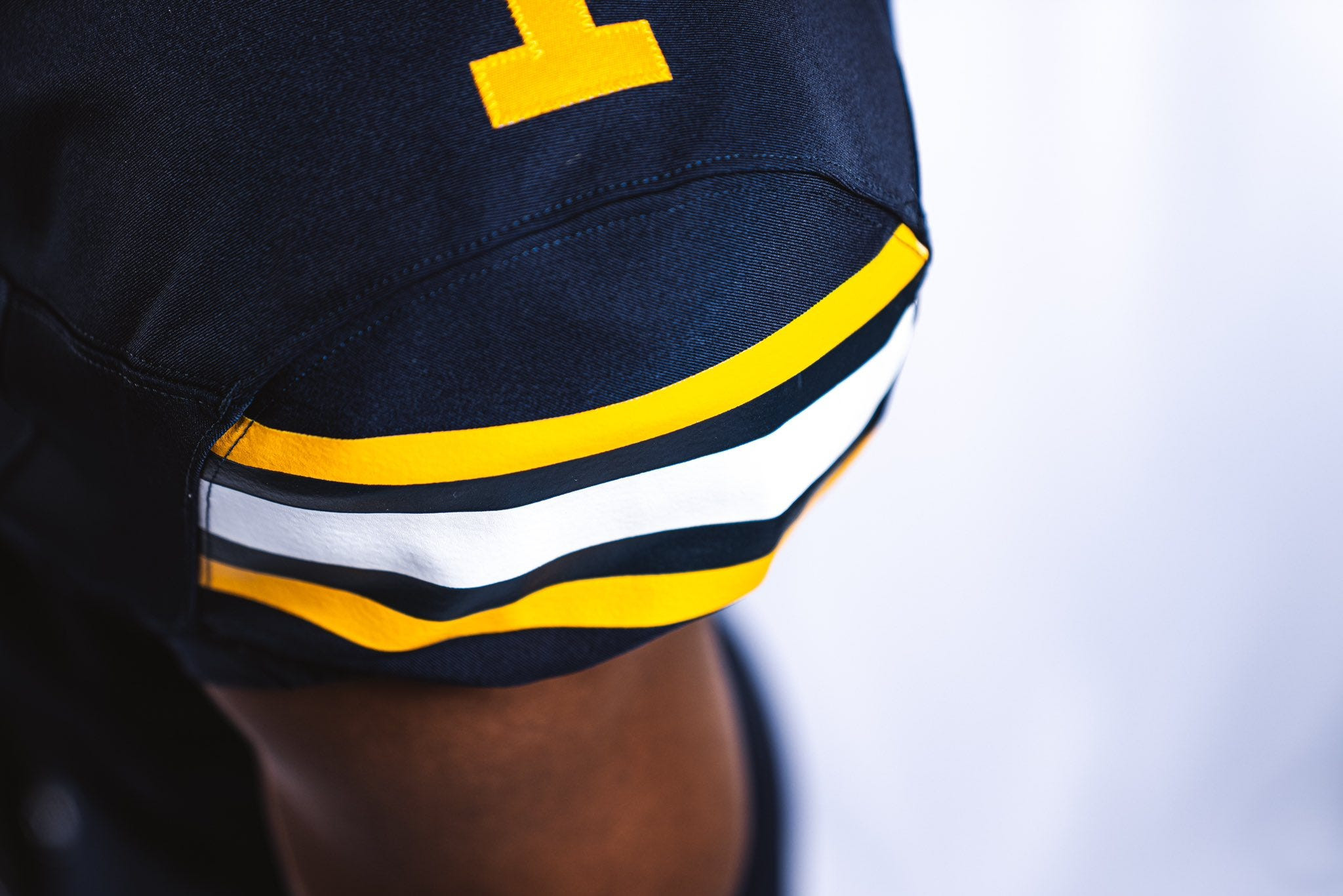Close-up of the new stripes on the California Golden Bears football jersey, showcasing a classic design for the 2024 season.