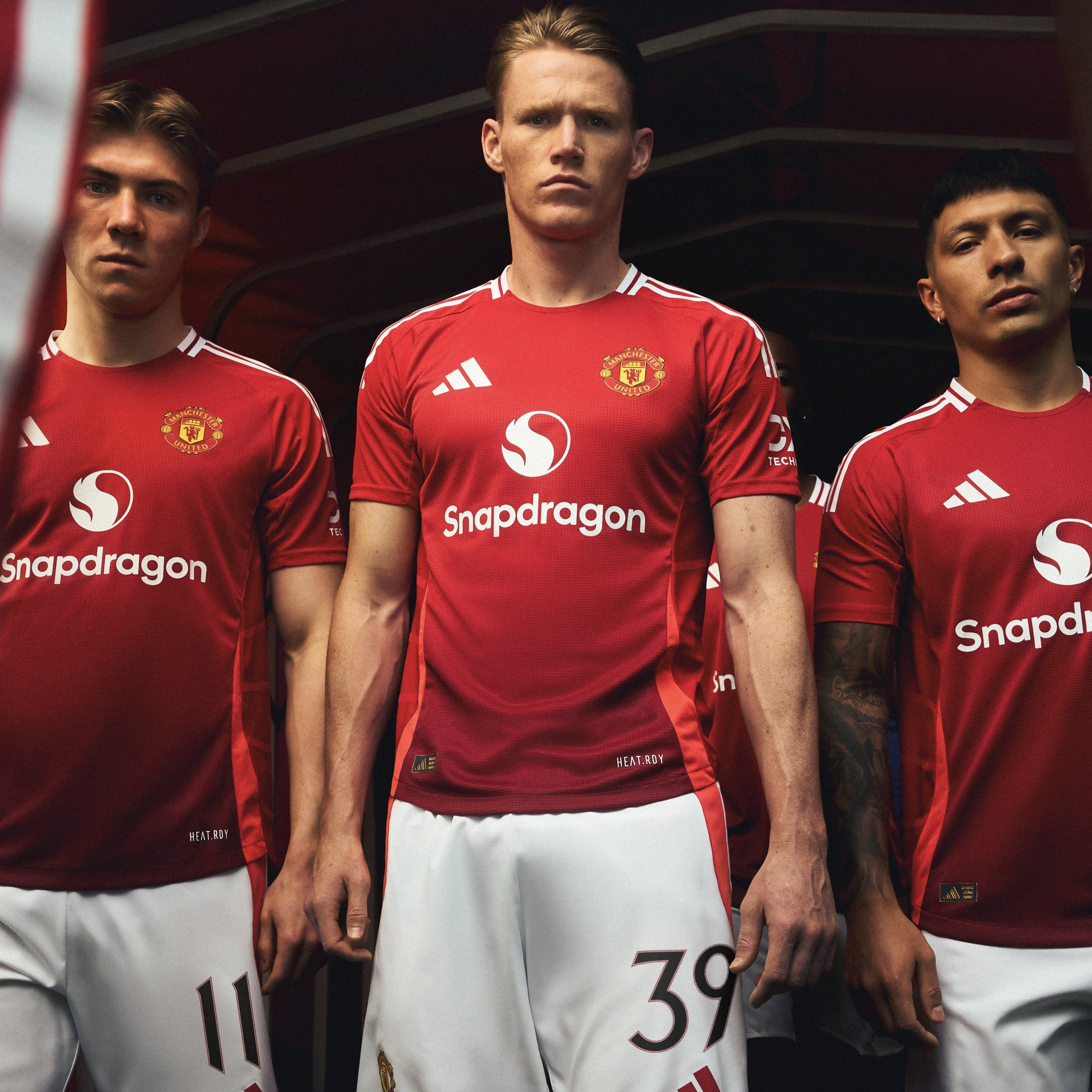 Manchester United 2024-2025 Home Jersey: The classic red devils look by Adidas.