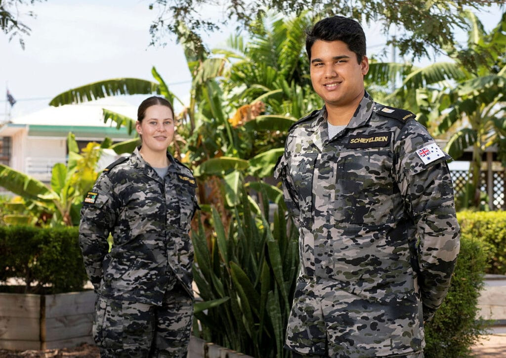 Seaman Gemma Silverstand and Midshipman Morgan Schieflebein demonstrate the Australian Multicam Camouflage Uniform (MMPU) at HMAS Coonawarra