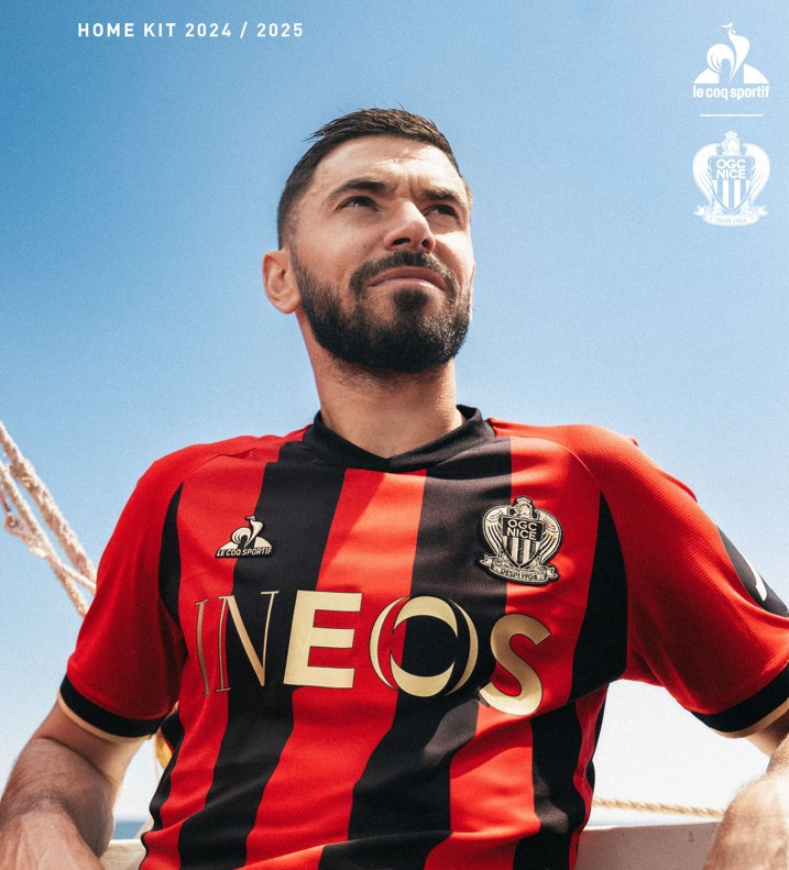 OGC Nice 2024-2025 Home Jersey: Classic red and black stripes by Macron.