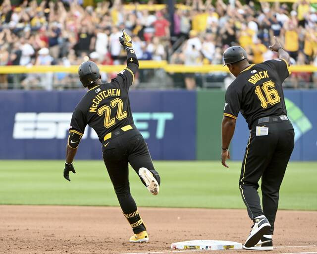 Full view of Pittsburgh Pirates monochrome black uniform combination during a game