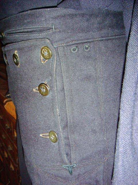 Detail of US Navy enlisted trousers from 1897 regulations showing eyelets and crow's foot stitching