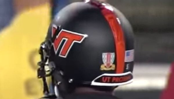 Side view of the Virginia Tech helmet with the circuit board design prominently displayed, part of the 2010 Nike Pro Combat series.
