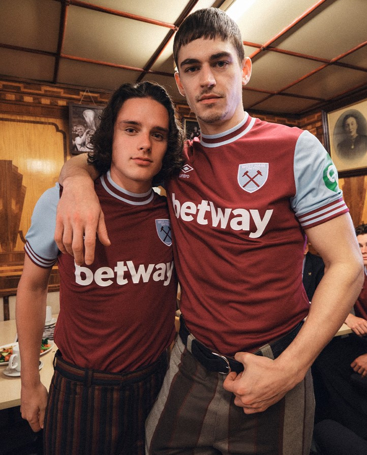 West Ham United 2024-2025 Home Jersey: Claret and blue design by Umbro.