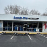 Exterior of Scrub Pro Uniforms store in Turnersville, New Jersey, showcasing storefront and signage.