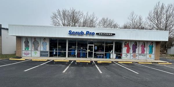 Exterior of Scrub Pro Uniforms store in Turnersville, New Jersey, showcasing storefront and signage.