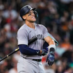 Aaron Judge of the New York Yankees showing sweat stains on his uniform during a game against the Houston Astros.
