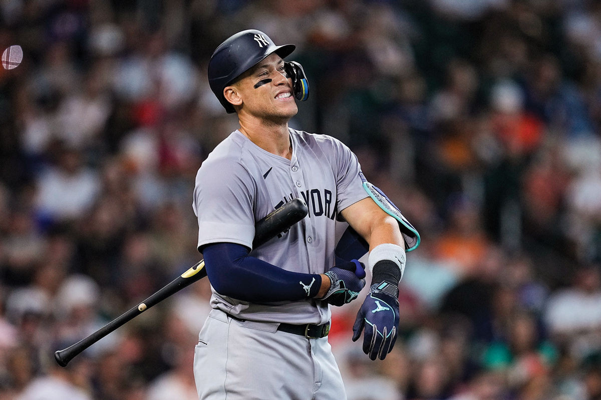 Aaron Judge of the New York Yankees showing sweat stains on his uniform during a game against the Houston Astros.
