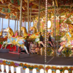 Horses on a merry-go-round exhibiting uniform circular motion