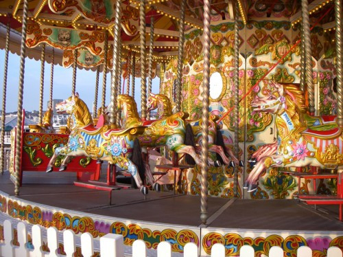 Horses on a merry-go-round exhibiting uniform circular motion