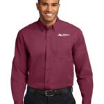 Model wearing maroon dress shirt with independent delivery professional logo.