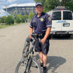 NYC cop in soft uniform with embroidered markings