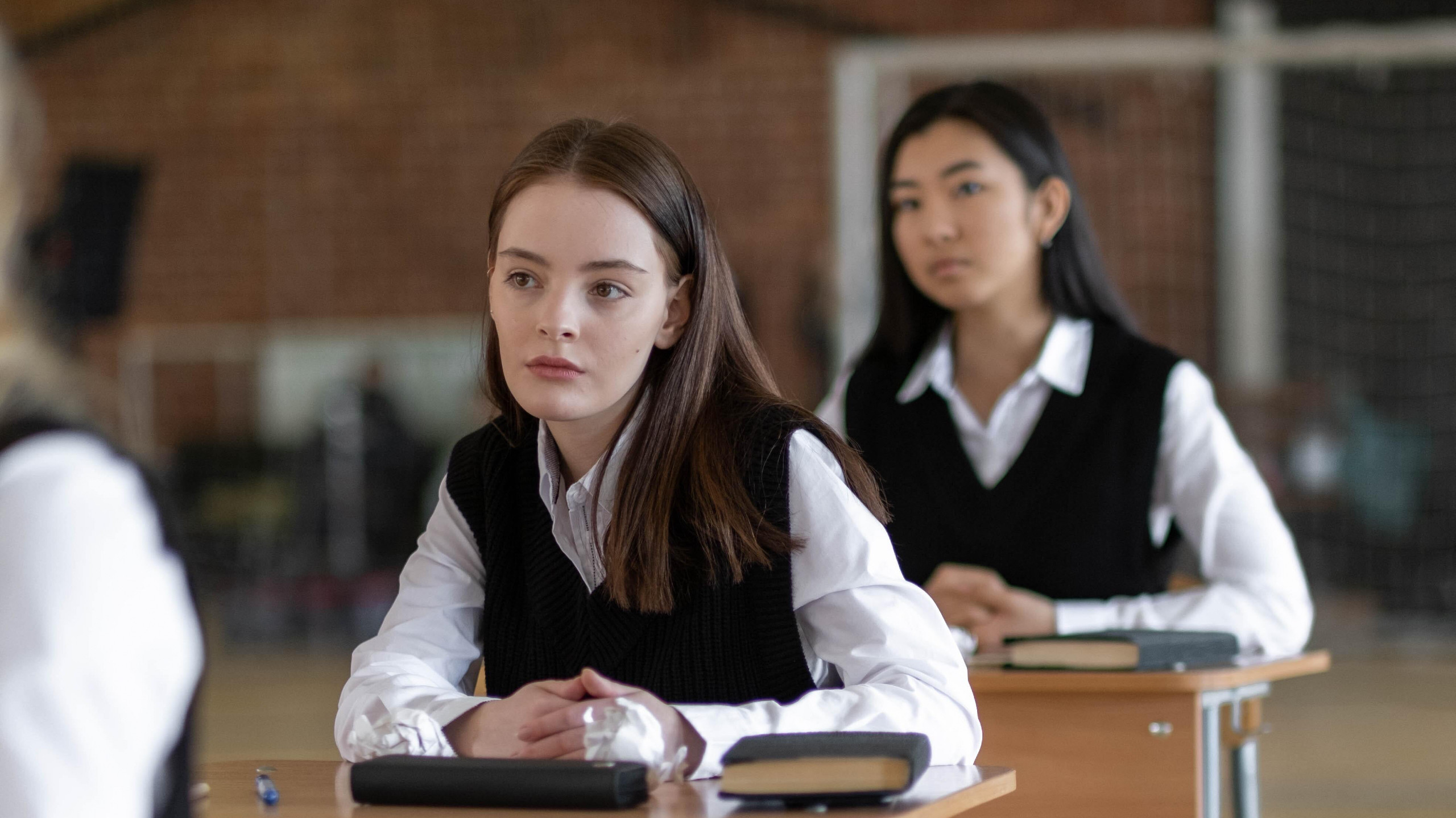 Students in school uniforms standing together